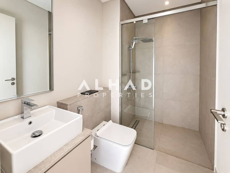 7 Minimalist Beige Modern Bathroom. png