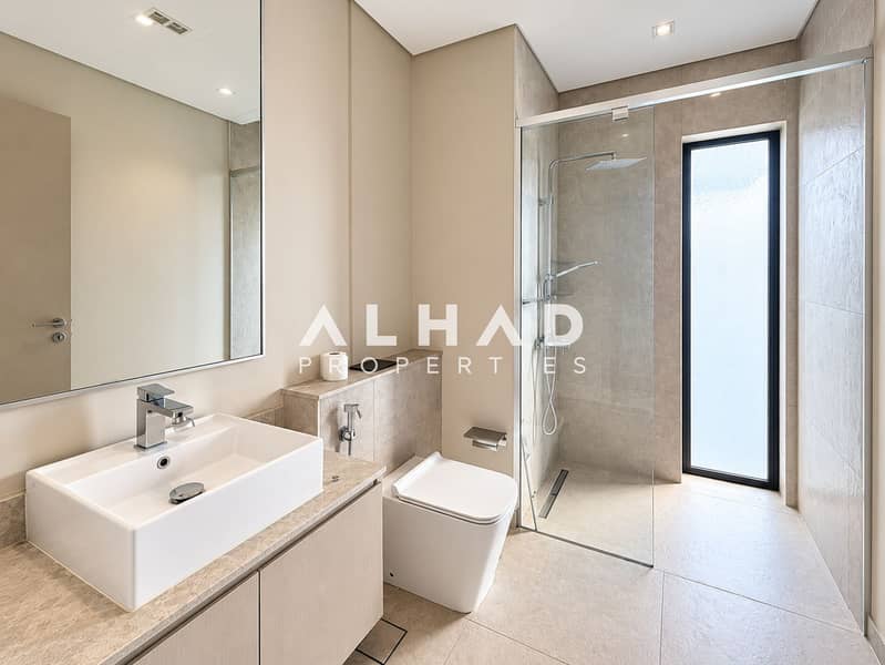 8 Modern Minimalist Bathroom with Walk-In Shower. png