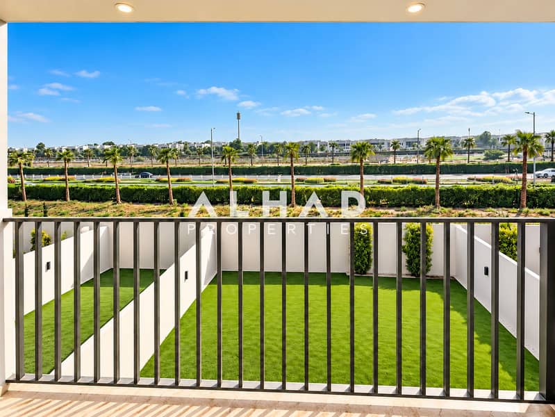 10 Modern Balcony Overlooking Enclosed Green Lawn. png