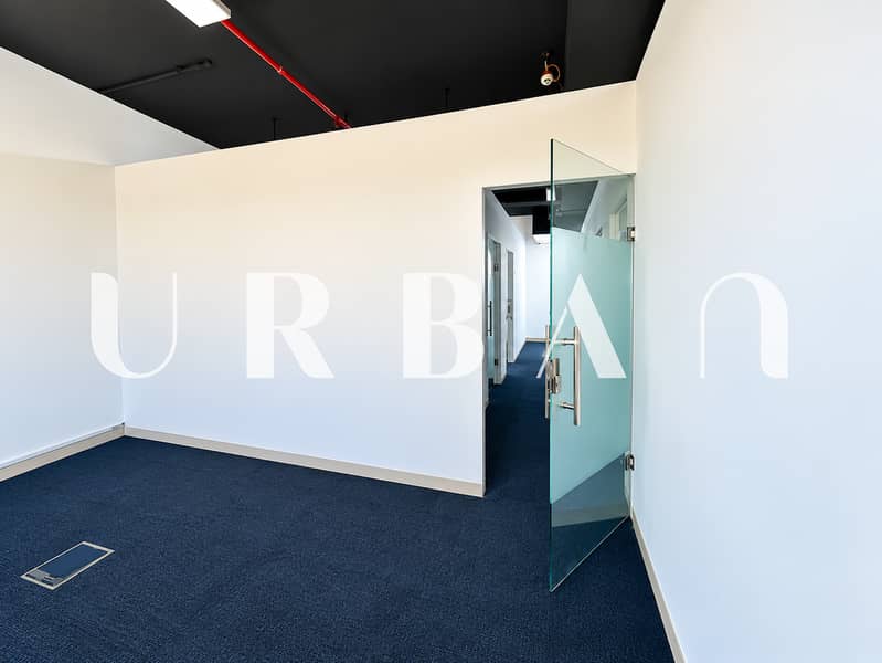 7 Modern Office with Glass Door and Urban Watermark (1). png