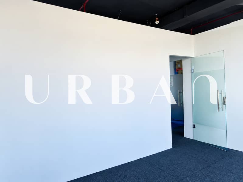 8 Modern Office with Glass Door and Urban Watermark. png