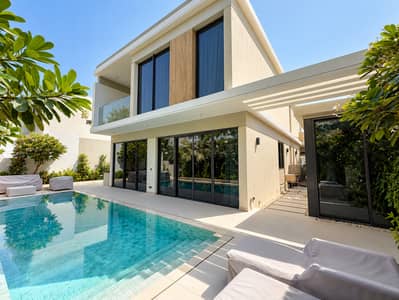 فیلا 4 غرف نوم للبيع في تلال الغاف، دبي - Villa contemporaine avec piscine turquoise. png