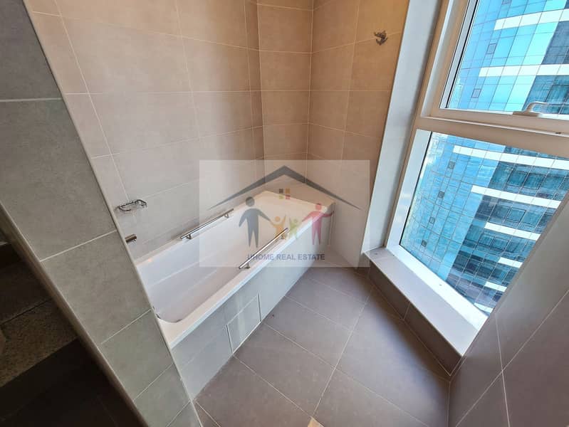 15 15-bathroom-bathtub-window. jpg