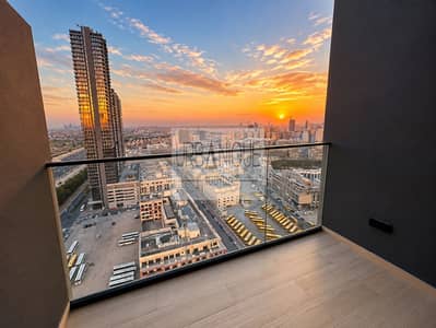 1 Slaapkamer Appartement te Huur in Jumeirah Village Circle (JVC), Dubai - Golden Hour City Balcony View. png