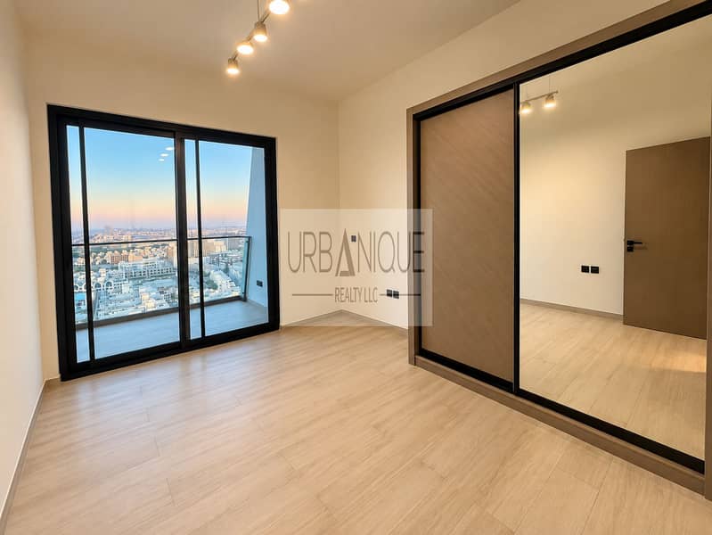 8 Minimalist Apartment Bedroom With City View. png