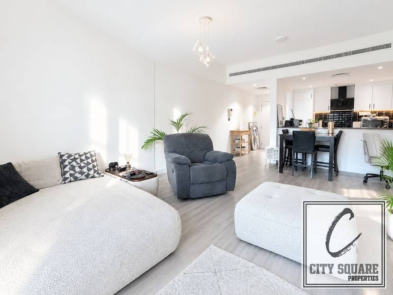 2 resize_Bright Minimalist Living and Kitchen Space. png