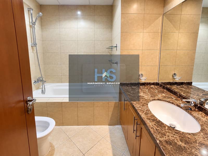 10 Luxurious Warm-Toned Marble Bathroom. png