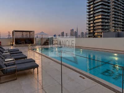 Studio te Huur in Jumeirah Village Circle (JVC), Dubai - Twilight Rooftop Pool Retreat. png