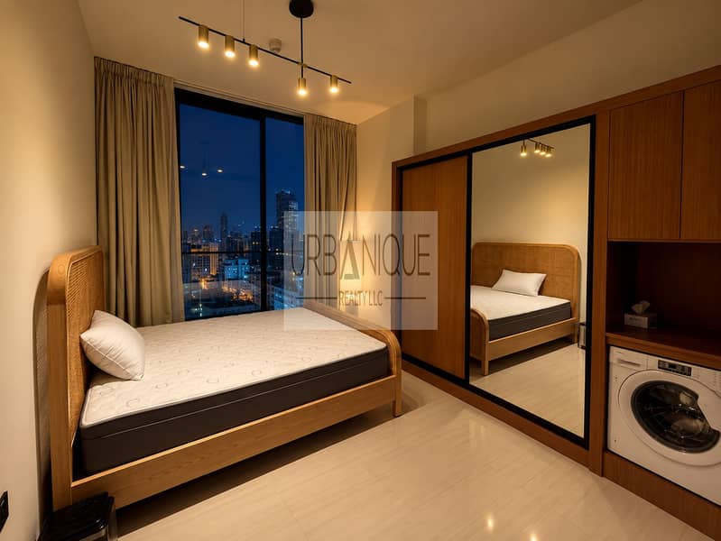 2 Cozy City View Bedroom at Night. png