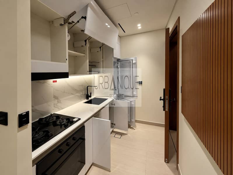 6 Modern Galley Kitchen at Night. png