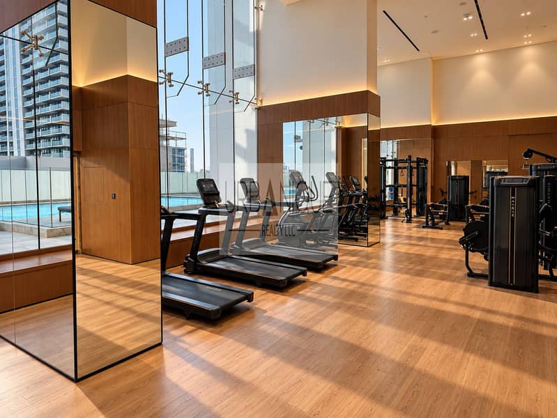 17 Luxury Sunlit Urban Condo Gym. png