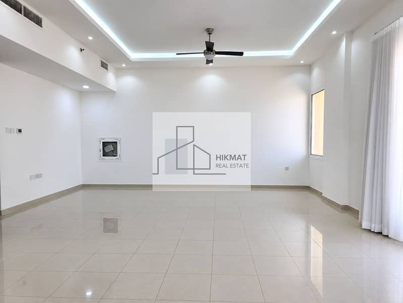 2 Minimalist Empty Living Room with Reflective Floors. png