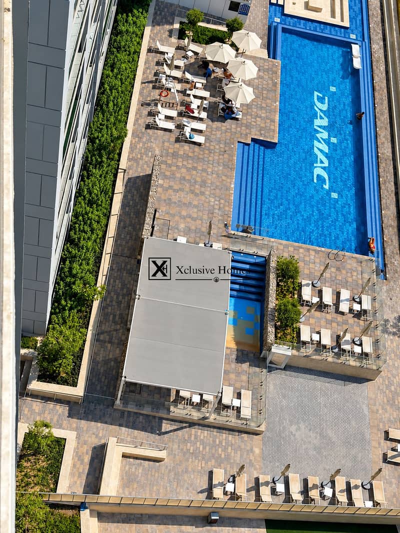 15 Crisp overhead poolside property view. png