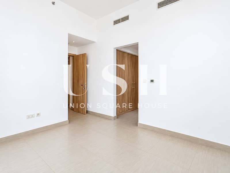 8 Bright Minimalist Room with Wooden Doors. png