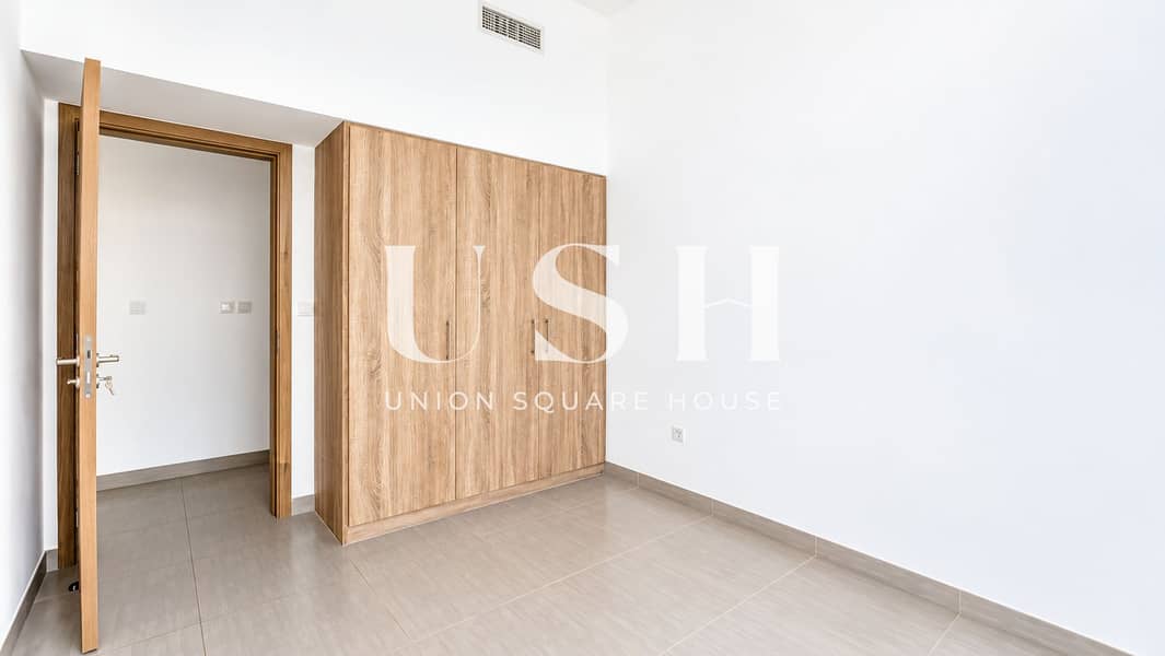10 Minimal White Room with Oak Wardrobe. png