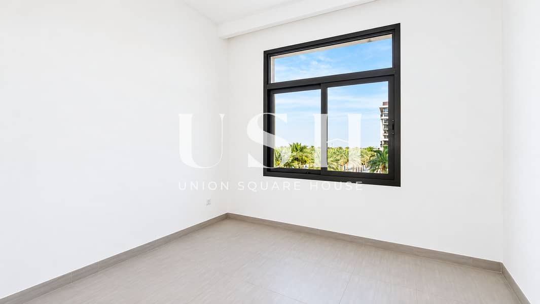 11 Minimal White Room with Tropical Window View. png