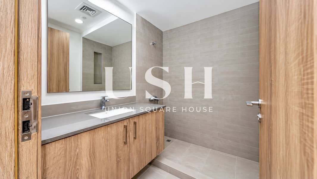15 Modern Minimalist Wood and Tile Bathroom. png
