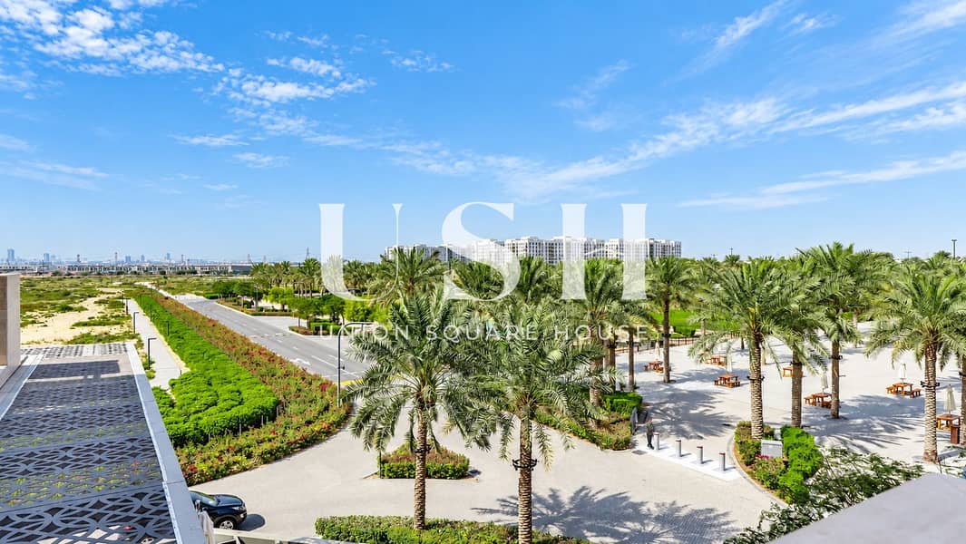 18 Sunny Palm-Lined Residential Park View. png