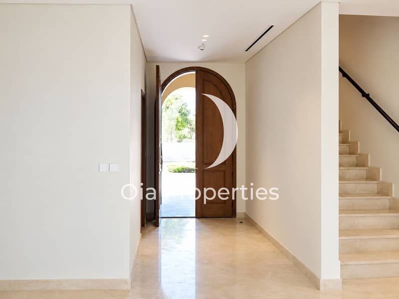 3 Sunlit Arched Doorway Foyer. png