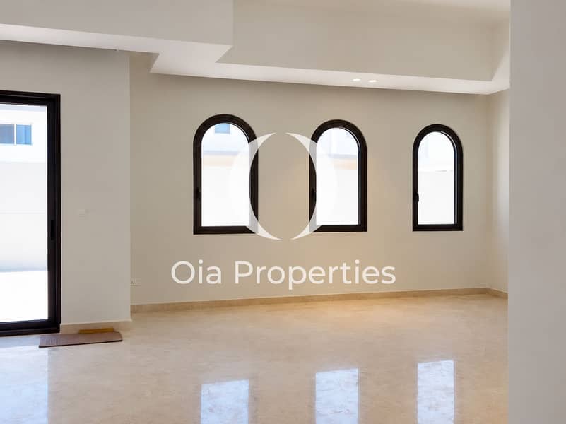 4 Minimalist Room with Arched Windows. png