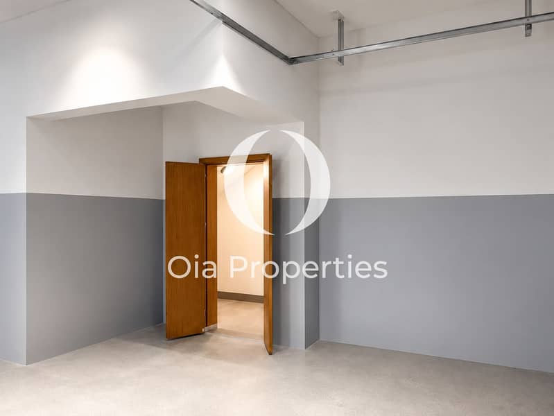 8 Minimalist Garage with Open Wooden Door. png