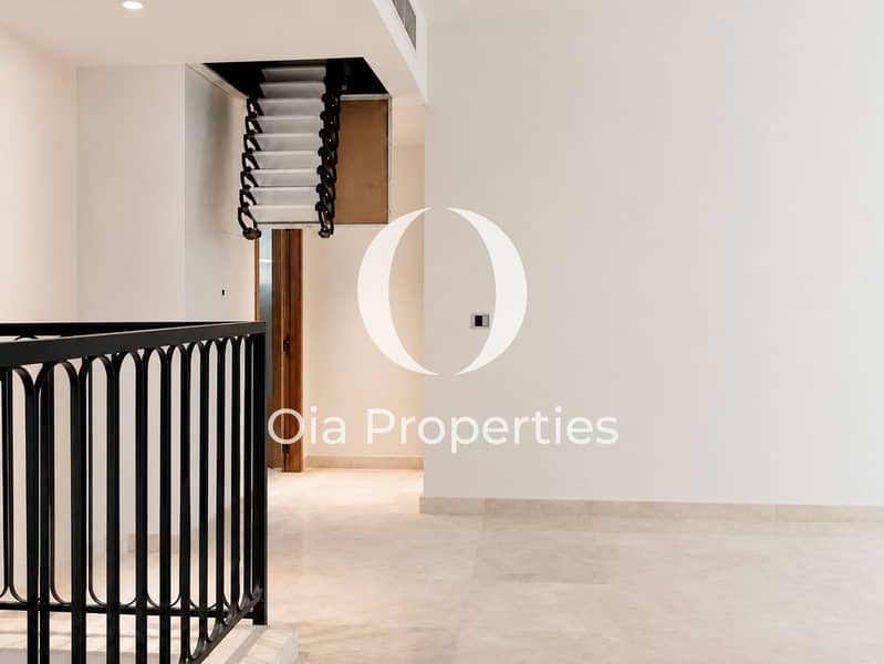 9 Minimalist Hallway with Retractable Attic Ladder. png