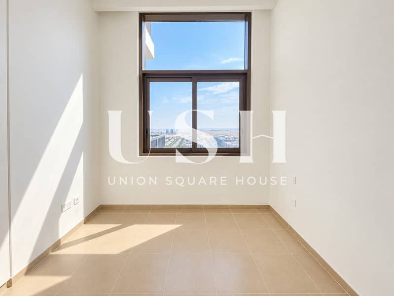 11 Sunlit Minimal Room with City View. jpg