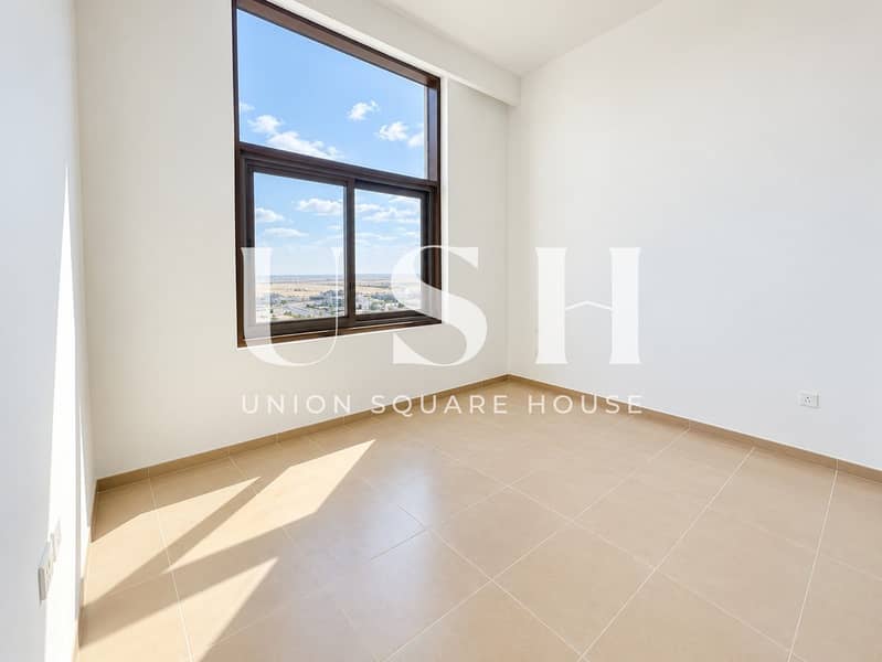 12 Sunlit Minimalist Room with City Views. jpg