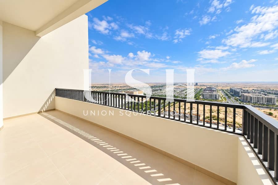 13 Sunlit Balcony Overlooking Desert City (1). jpg