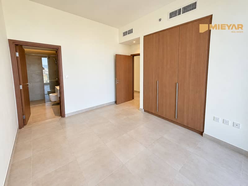 8 Bright Minimalist Room with Wooden Doors. png