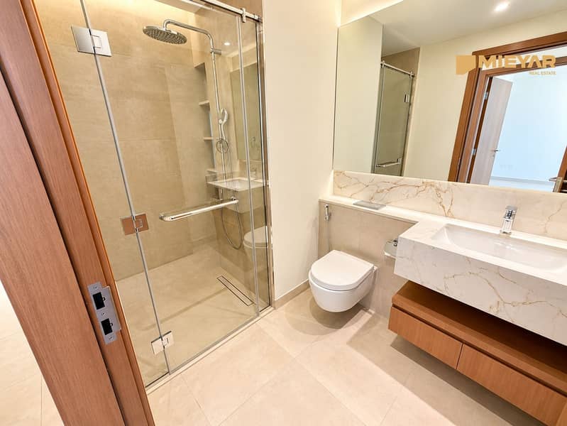 9 Modern Beige Marble Bathroom. png