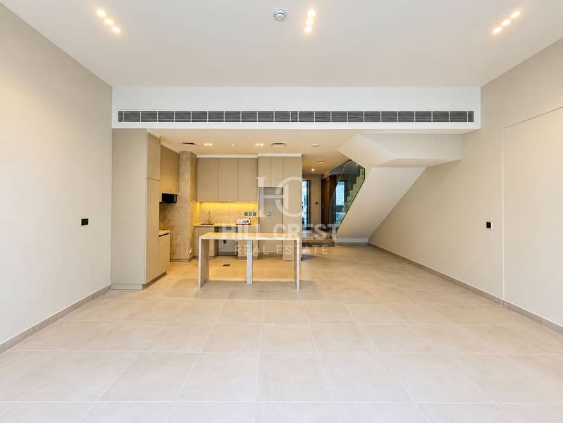 9 Minimalist Townhouse Kitchen and Open Living Space. png