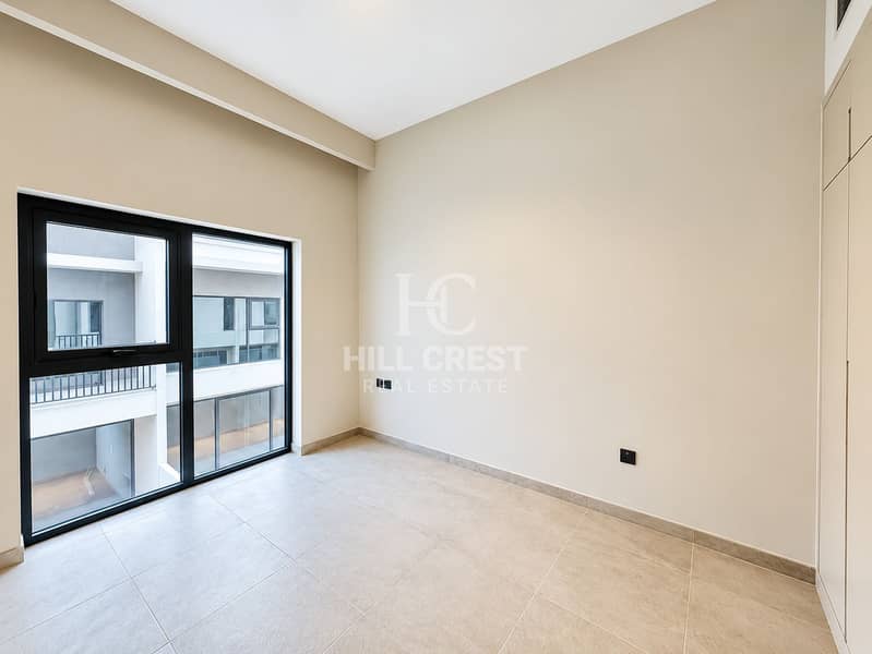 19 Bright Minimalist Room with City View. png