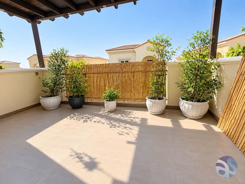 9 Sunny Mediterranean Terrace with Pergola and Plants. png
