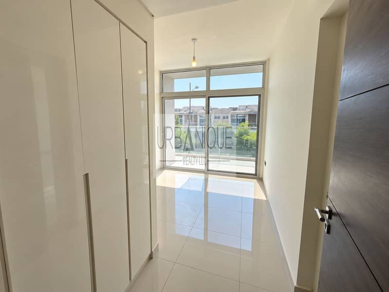 7 Bright Modern Hallway with Balcony Views. png