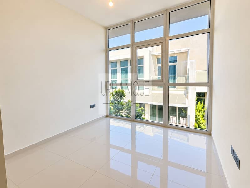 8 Bright Minimalist Room with Window Wall. png