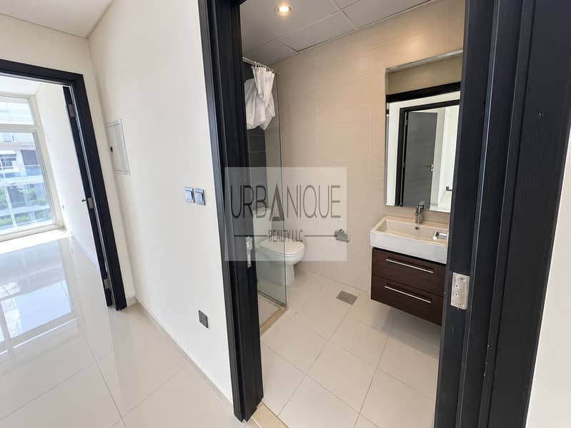 9 Modern Hallway to Minimalist Bathroom. png