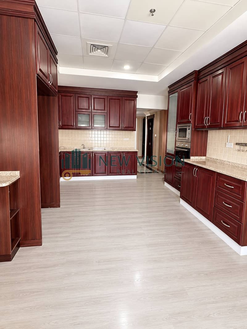 16 Spacious Mahogany Kitchen Interior. png