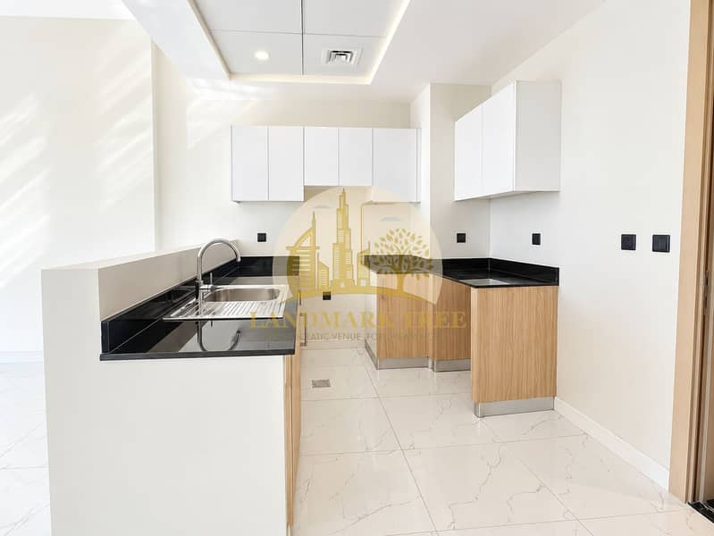 2 Bright Modern Kitchen with Black Counters. png