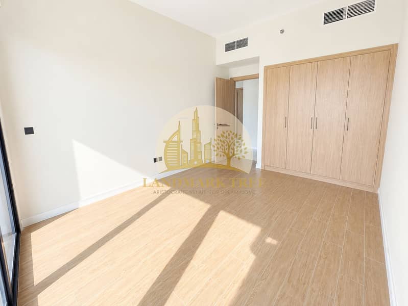9 Sunlit Minimalist Bedroom with Wood Wardrobe. png