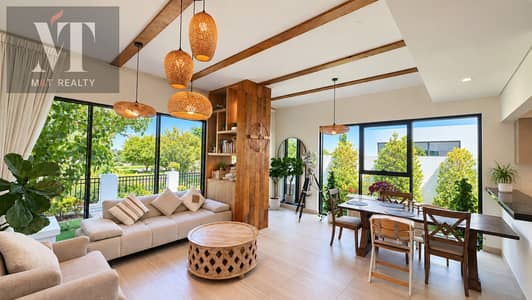 4 Camere Villa in affitto a DAMAC Hills, Dubai - Silver Tripod Lamp and Wooden High Chair-13. png