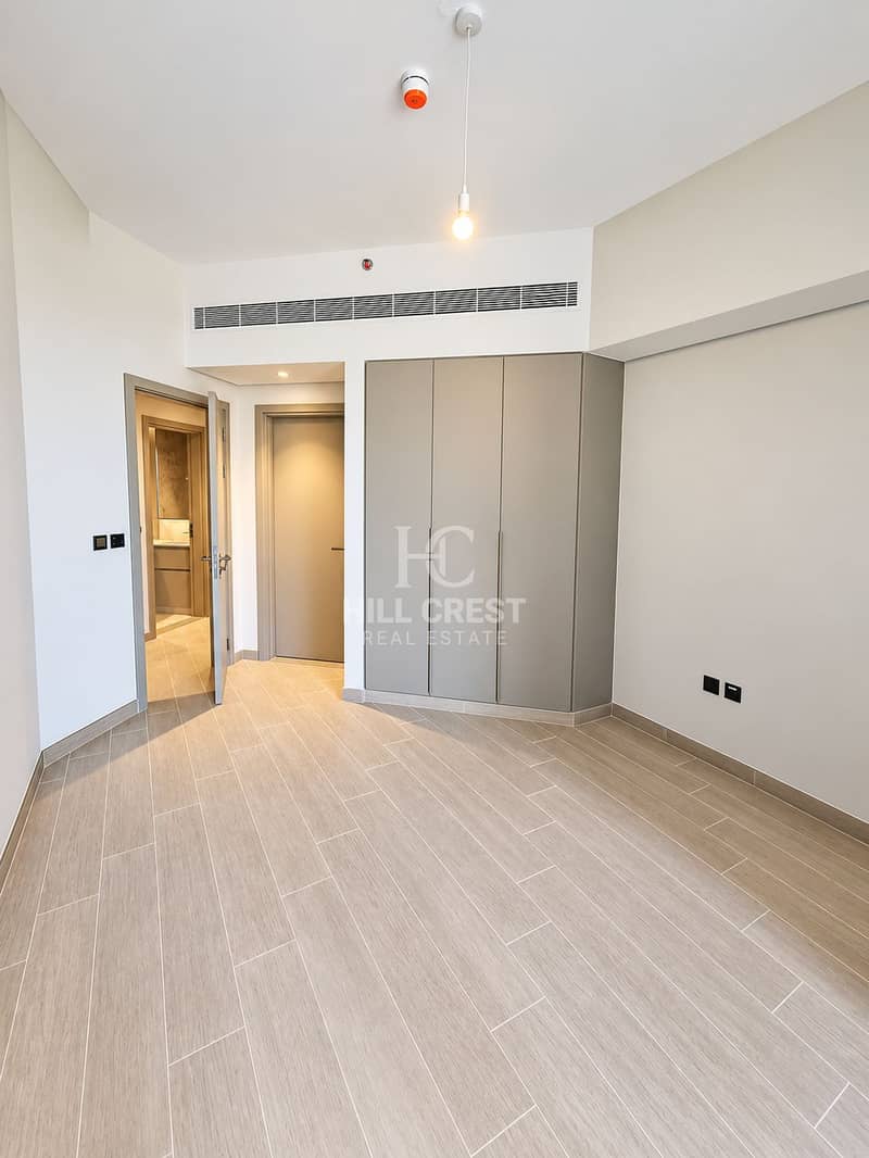 5 Minimalist Greige Room with Built-In Wardrobe. png