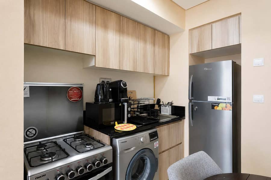 6 Damac Hills 1BR Apartment with Pool & Balcony