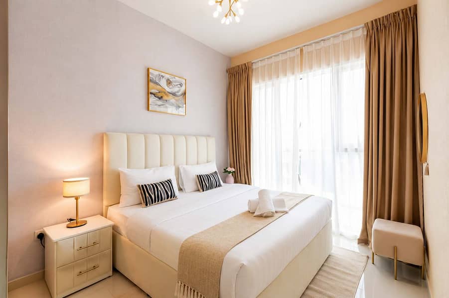 7 Damac Hills 1BR Apartment with Pool & Balcony
