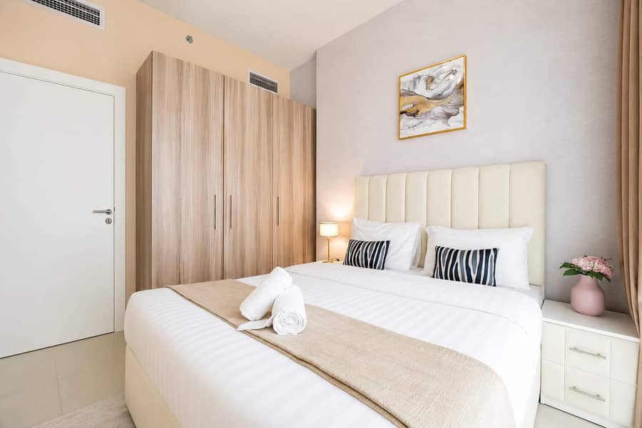 8 Damac Hills 1BR Apartment with Pool & Balcony