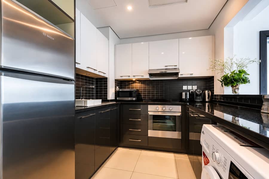 7 Silverene Tower 1BR: Pool, Gym & Dubai Views!