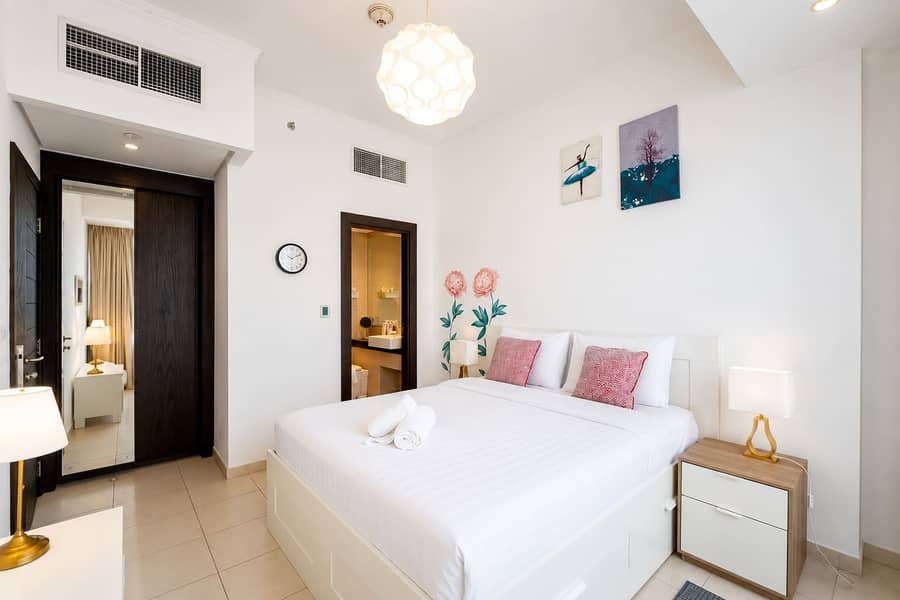 9 Silverene Tower 1BR: Pool, Gym & Dubai Views!