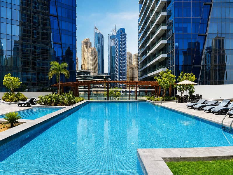 15 Silverene Tower 1BR: Pool, Gym & Dubai Views!