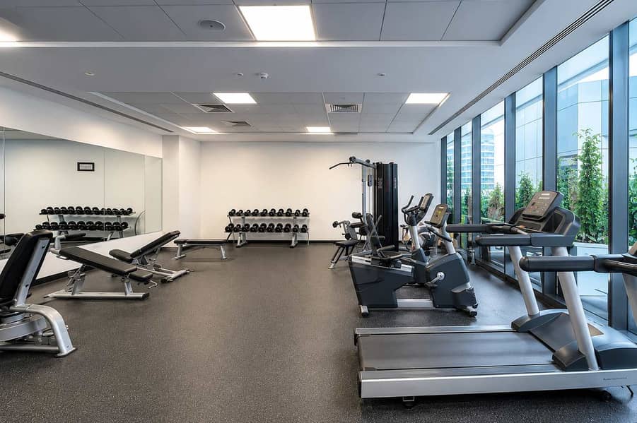 16 Silverene Tower 1BR: Pool, Gym & Dubai Views!