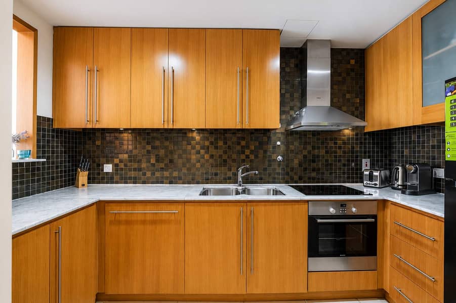 8 Dubai Apartment: 1BR with Pool, Gym & Balcony